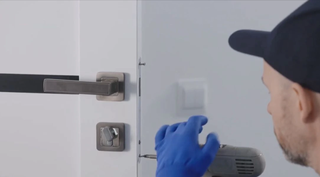 Locksmith rekeying a residential door lock in Wichita Falls